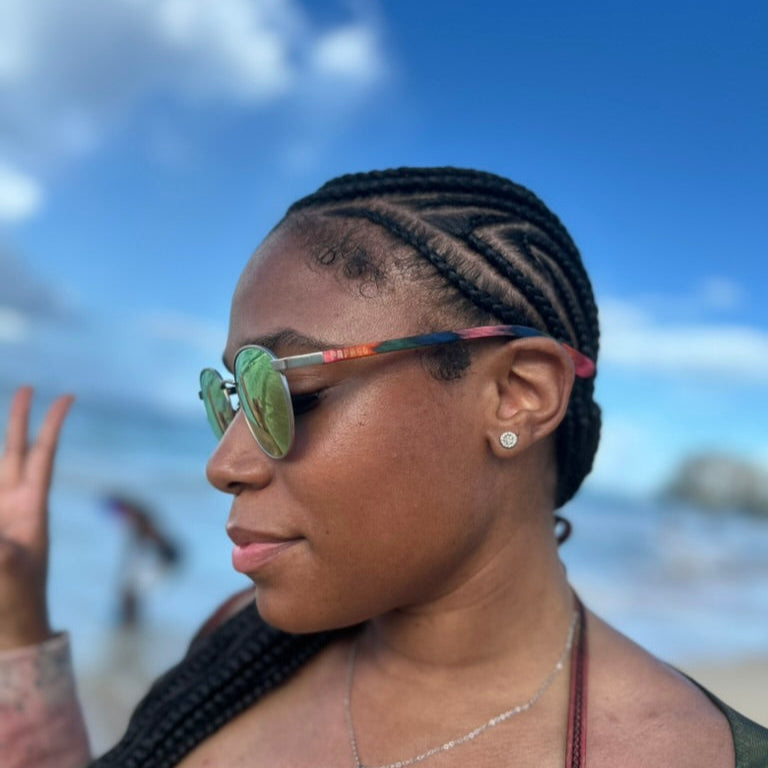 Papago Peacock Onofres sunglasses with colorful, patterned frames and dark tinted lenses for stylish eye protection.