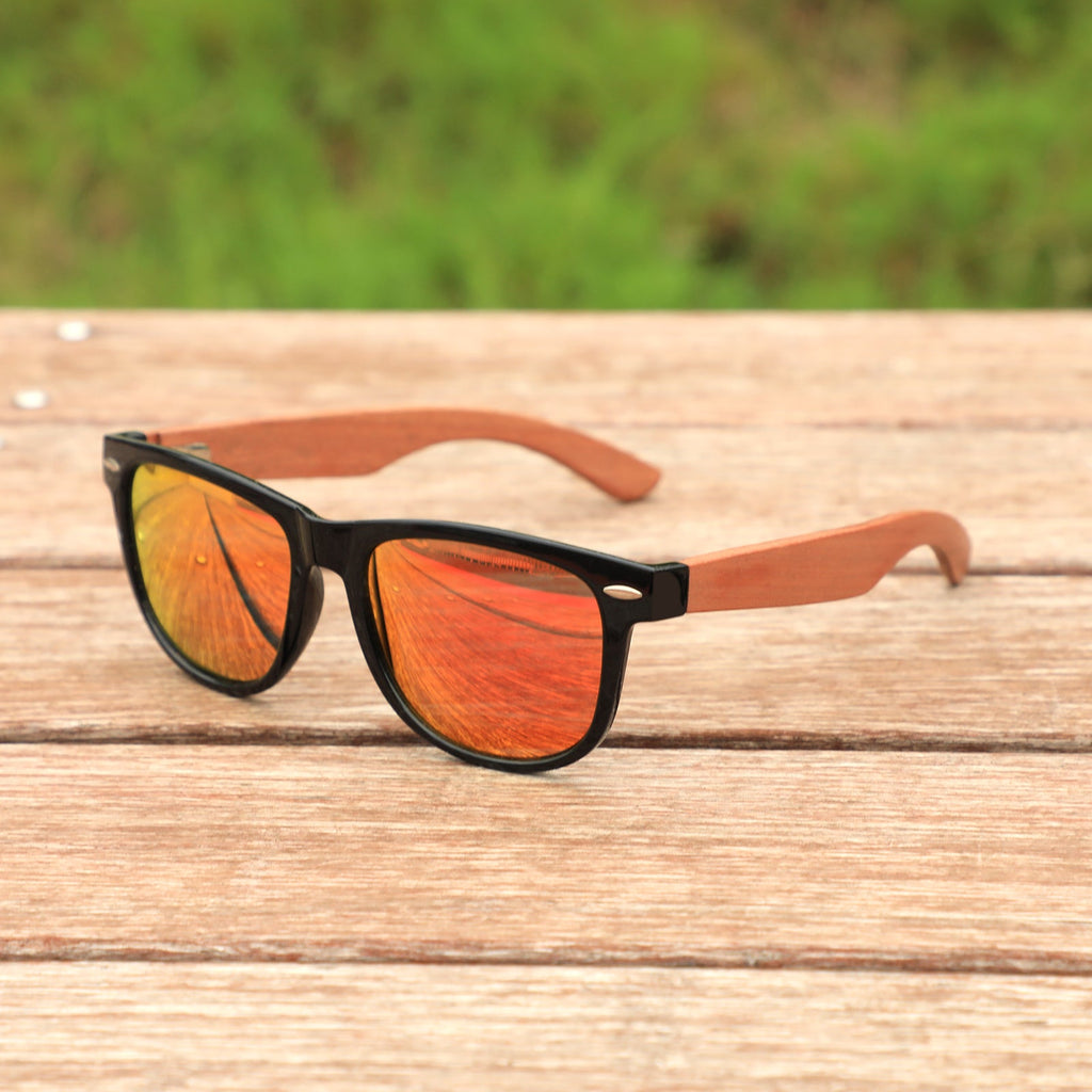 Handmade recycled wooden sunglasses from Papago featuring Sunset Magnolias design with stylish, eco-friendly frames.
