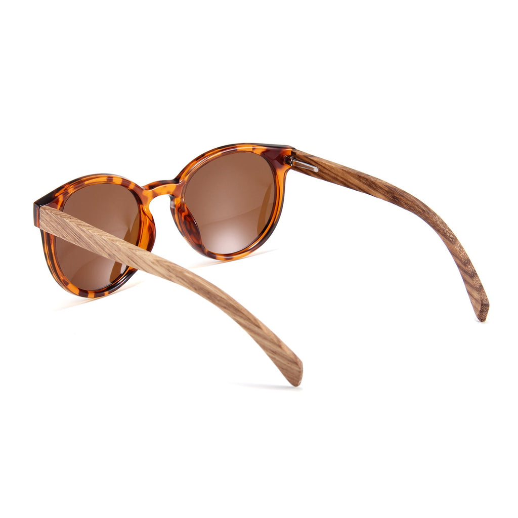 Handmade Papago Tortoise Lidos sunglasses with recycled wooden frames, showcasing natural wood grain and classic tortoise pattern.