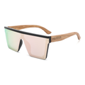 Papago Coral Voyagers sunglasses with orange-tinted lenses and sleek frame, showcasing stylish eyewear design.