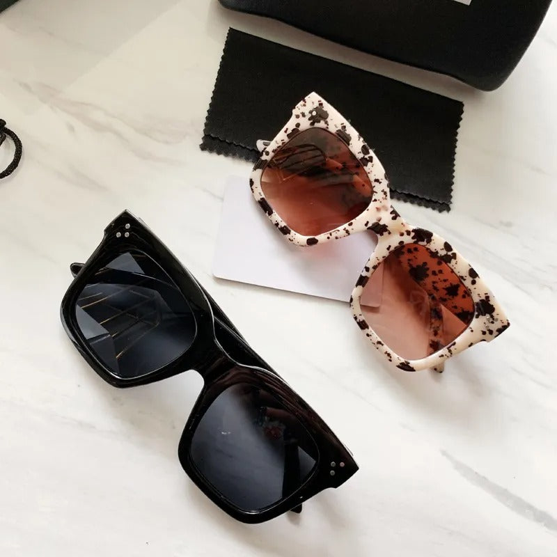 Retro square UV400 sunglasses by RAMODO JEWELRY with black frames and dark tinted lenses, stylish and protective eyewear.