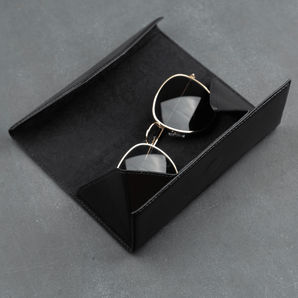 Black luxury leather sunglasses case by LEATHERE, designed as an elegant eyewear accessory for protecting sunglasses.