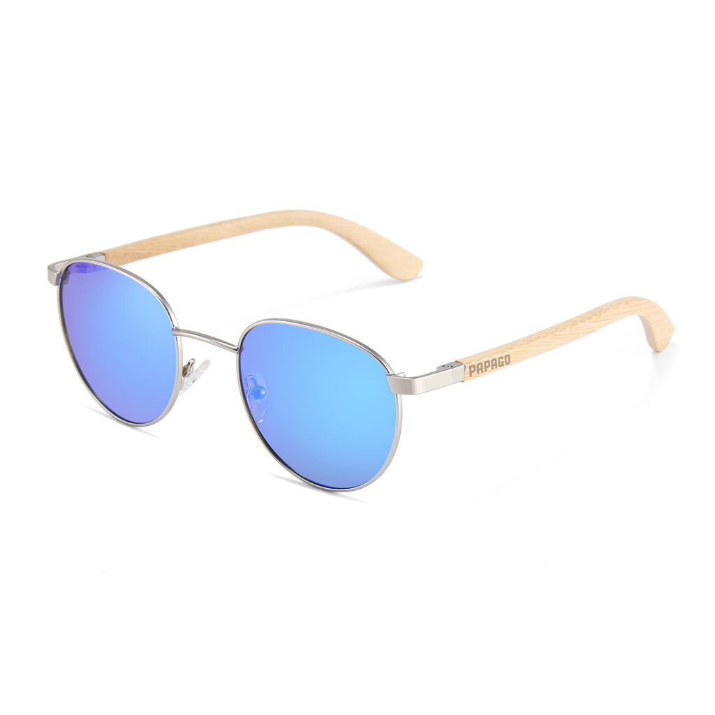 Handmade recycled wooden sunglasses by Papago Azule Onofres with dark lenses and natural wood frames.
