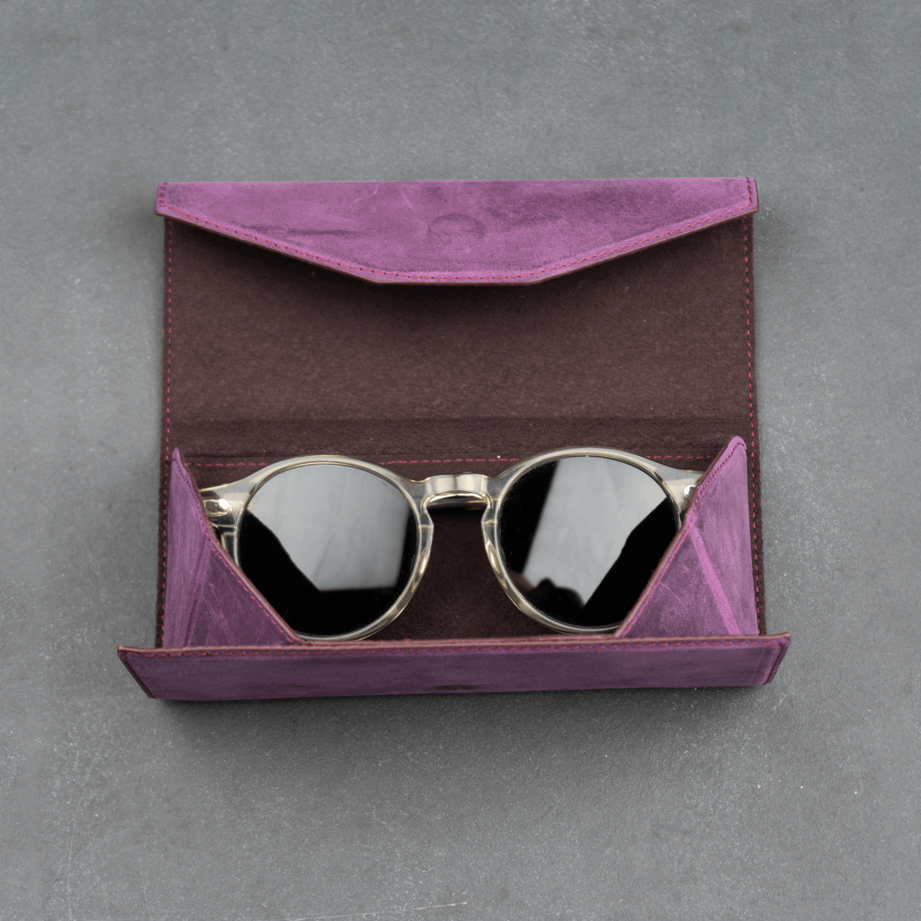 Purple luxury leather sunglasses case by LEATHERE, stylish eyewear accessory for protecting sunglasses.