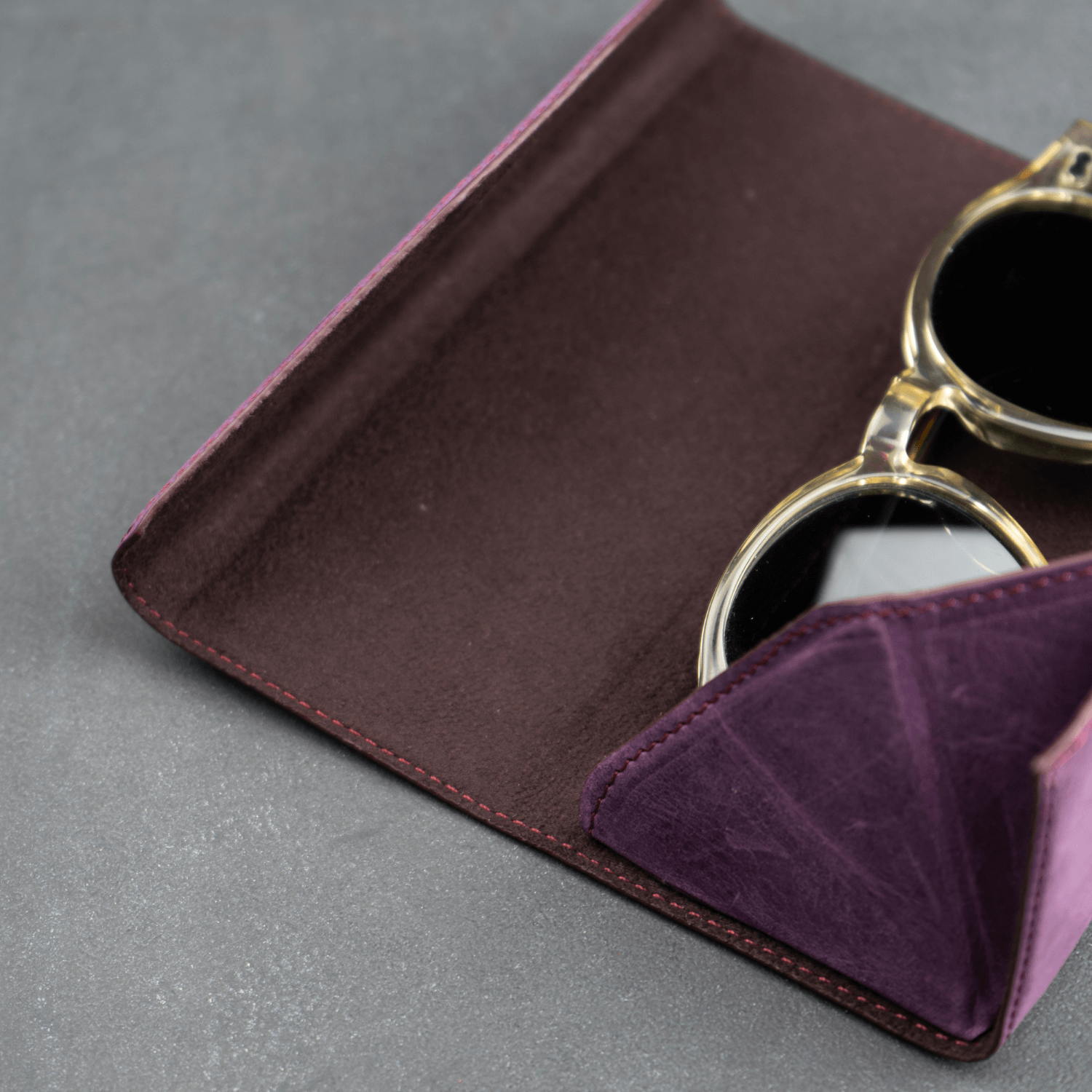 LEATHERE luxury leather sunglasses case in purple, designed as an eyewear accessory for stylish protection.