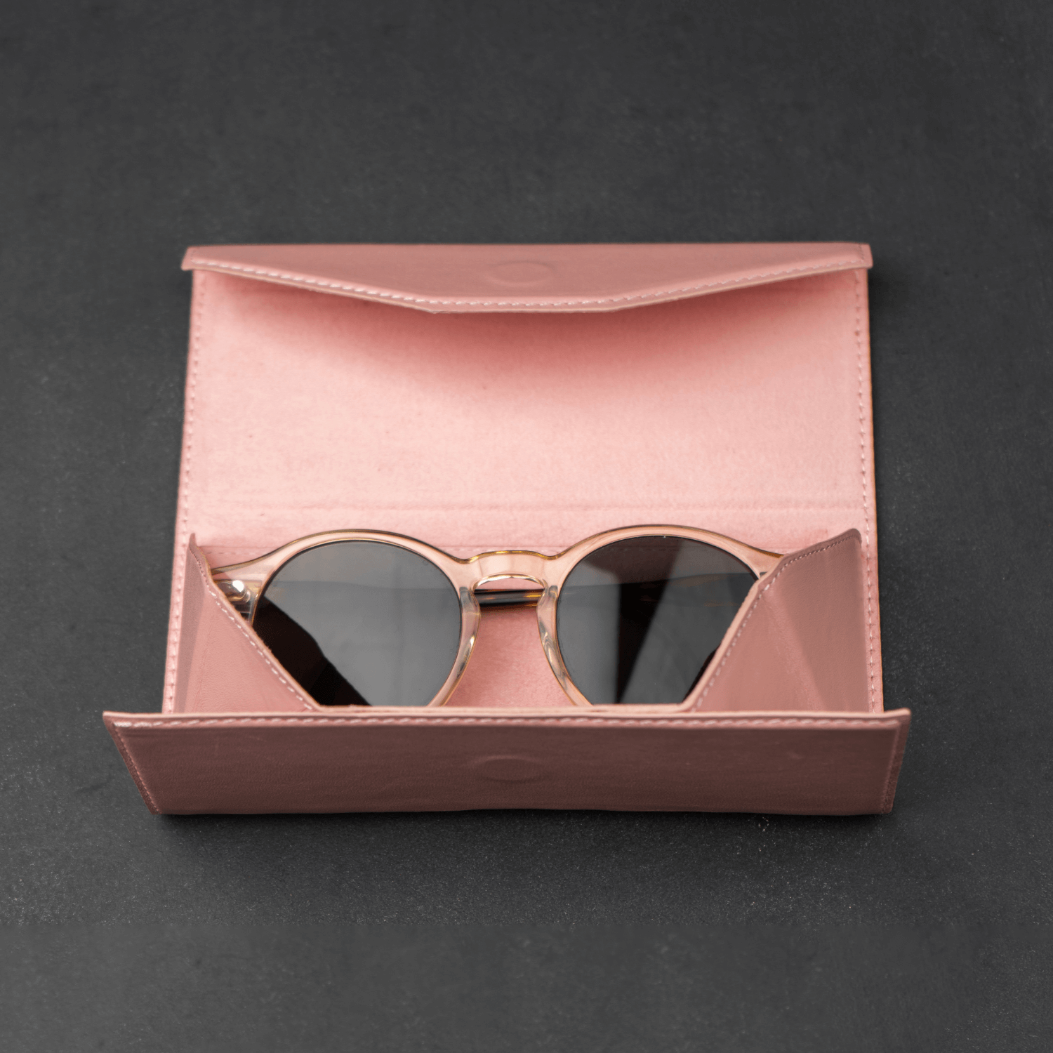 Pink luxury leather sunglasses case by LEATHERE, stylish eyewear accessory with soft interior for protection.