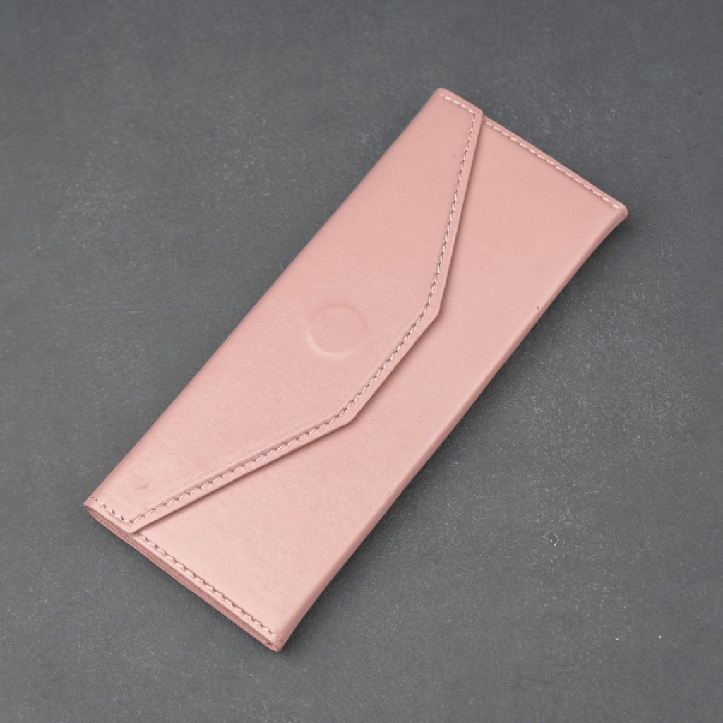Pink luxury leather sunglasses case by LEATHERE, stylish eyewear accessory for protecting and storing sunglasses.