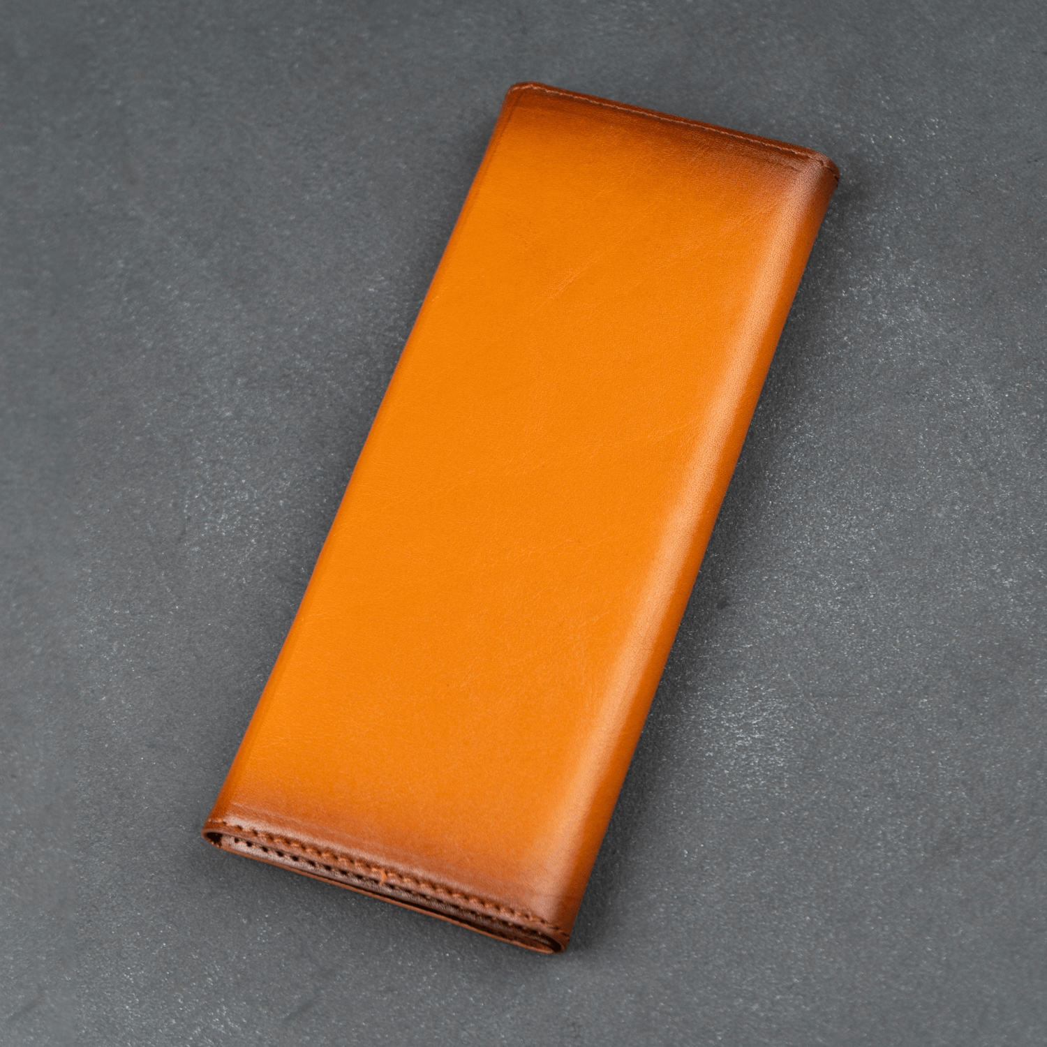 Rustic brown leather sunglasses case by LEATHERE, designed for eyewear accessories with a sleek, protective exterior and elegant finish.