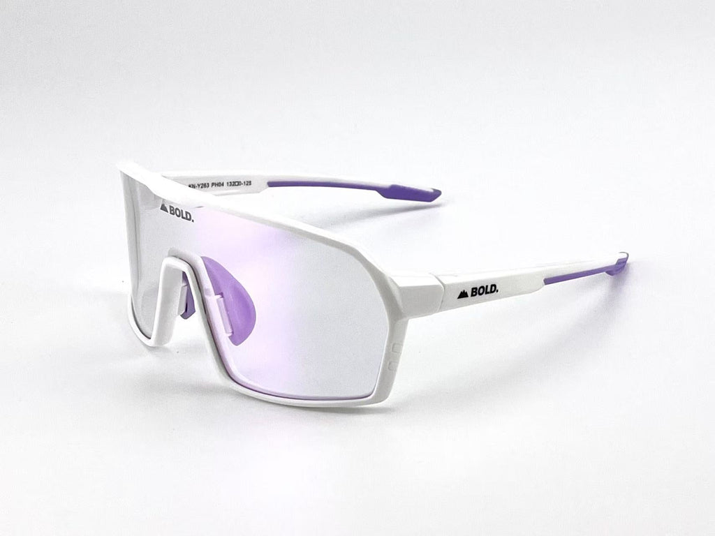 Boldouterwear BOLD Drift photochromic sunglasses with tinted lenses, outdoor eyewear designed for versatile sun protection.