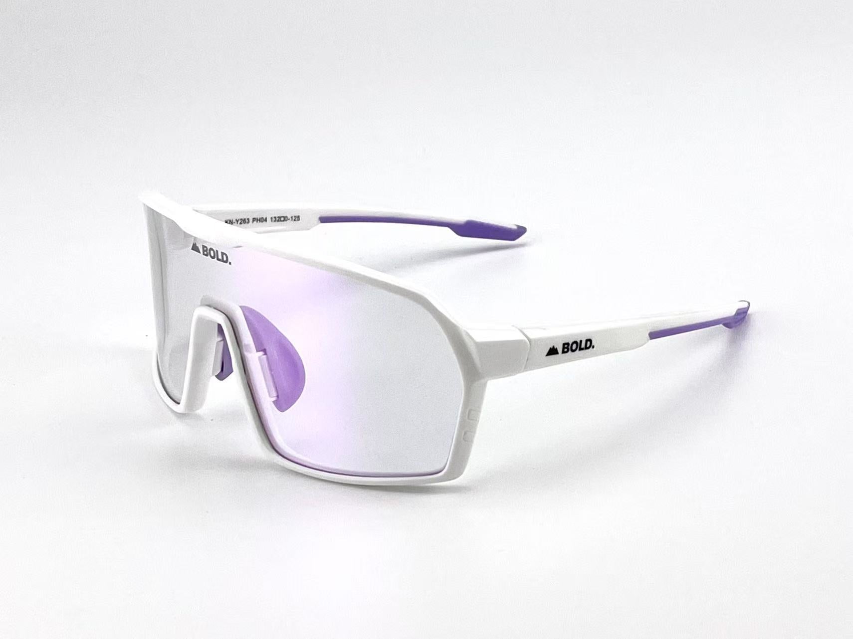 Boldouterwear BOLD Drift photochromic sunglasses with tinted lenses, outdoor eyewear designed for versatile sun protection.