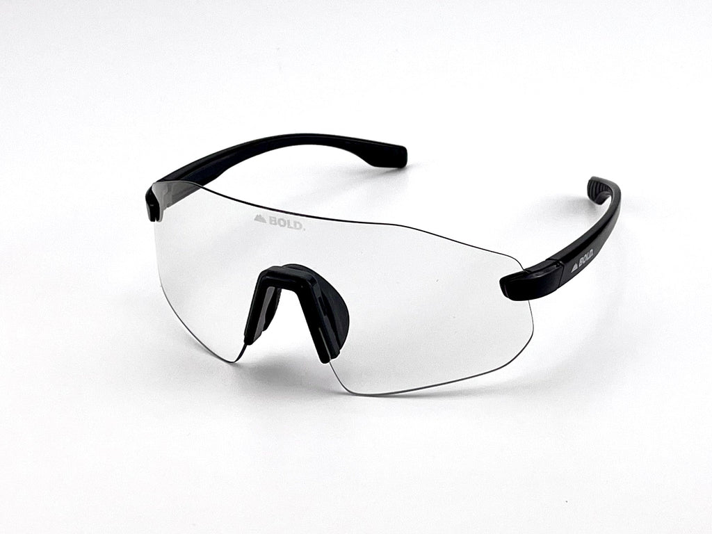 Boldouterwear Emerald photochromic sunglasses with tinted lenses, designed for outdoor wear and adjustable sunlight protection.