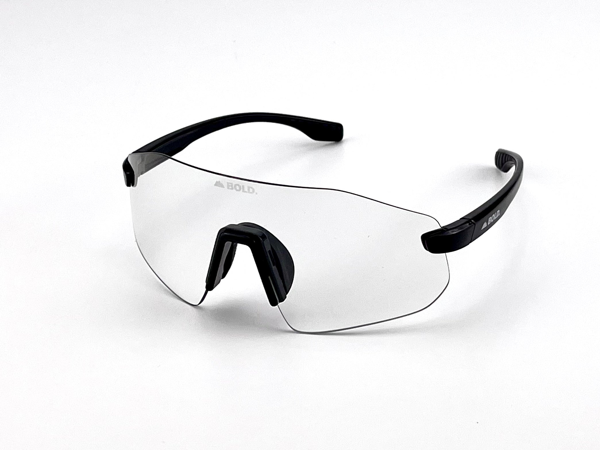 Boldouterwear Emerald photochromic sunglasses with tinted lenses, designed for outdoor wear and adjustable sunlight protection.
