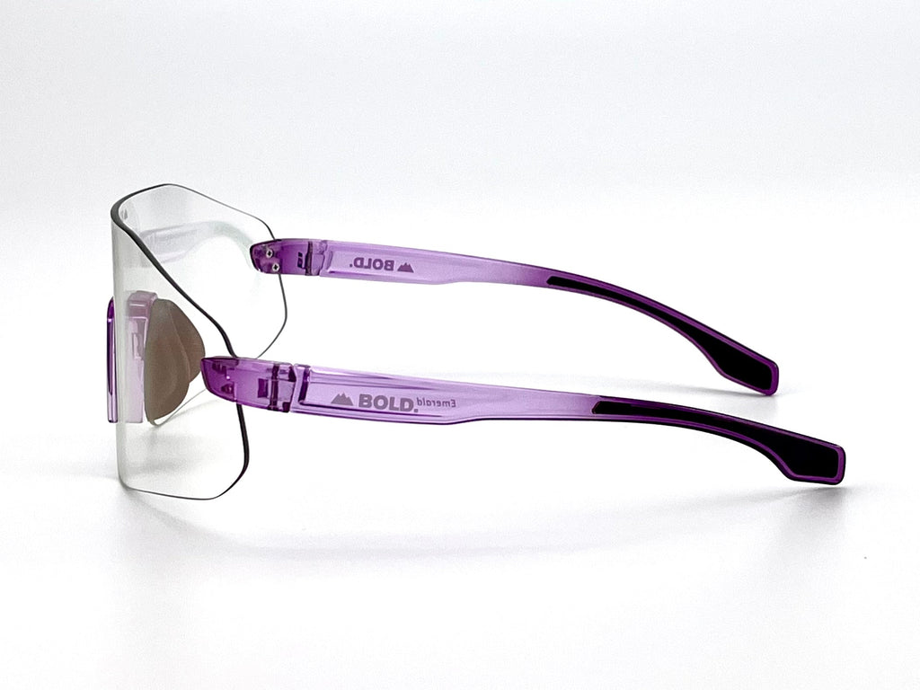 Boldouterwear BOLD Emerald photochromic sunglasses with green-tinted lenses and sleek outdoor eyewear design.