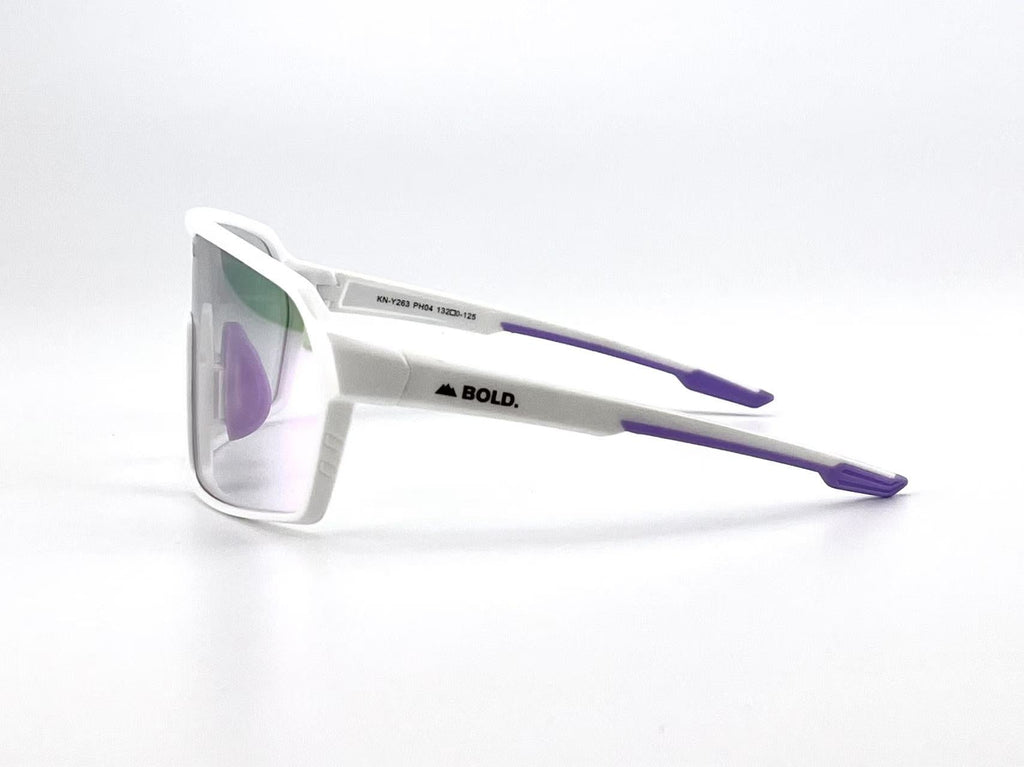 Boldouterwear BOLD Drift photochromic sunglasses with tinted lenses and sleek black frames, designed for outdoor wear.
