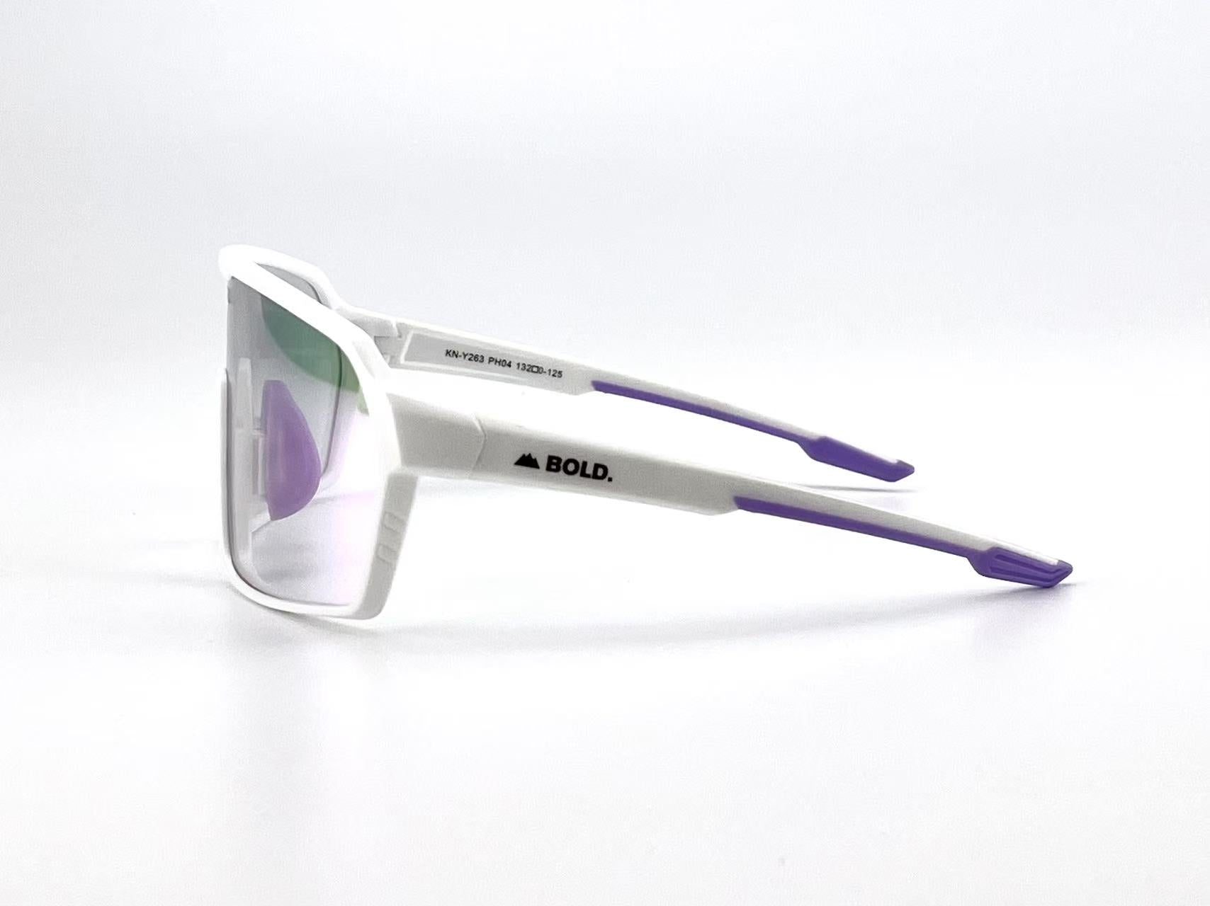 Boldouterwear BOLD Drift photochromic sunglasses with tinted lenses and sleek black frames, designed for outdoor wear.
