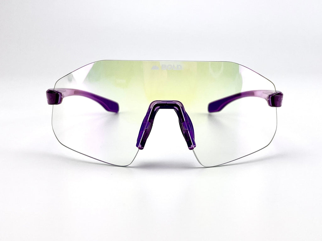 Boldouterwear BOLD Emerald photochromic sunglasses with green-tinted lenses, outdoor eyewear designed for versatile sun protection.