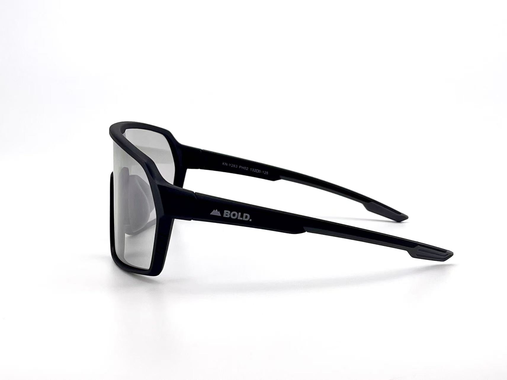 Boldouterwear Drift photochromic sunglasses with outdoor lenses, showing how they adapt to changing light conditions.