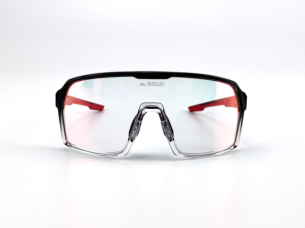 Boldouterwear BOLD Drift photochromic sunglasses showing dark tinted lenses in a sleek outdoor eyewear design.