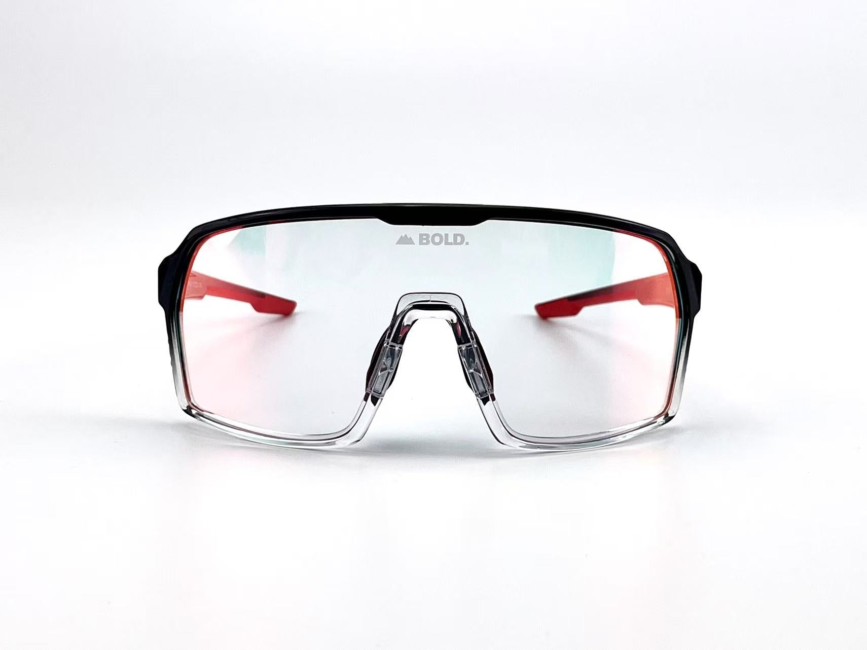 Boldouterwear BOLD Drift photochromic sunglasses showing dark tinted lenses in a sleek outdoor eyewear design.