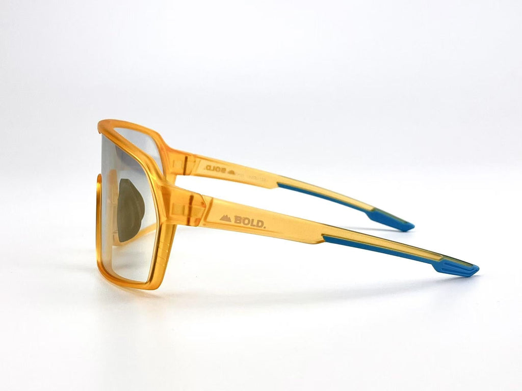 Boldouterwear Drift photochromic sunglasses with outdoor lenses, featuring sleek black frames and adjustable nose pads.