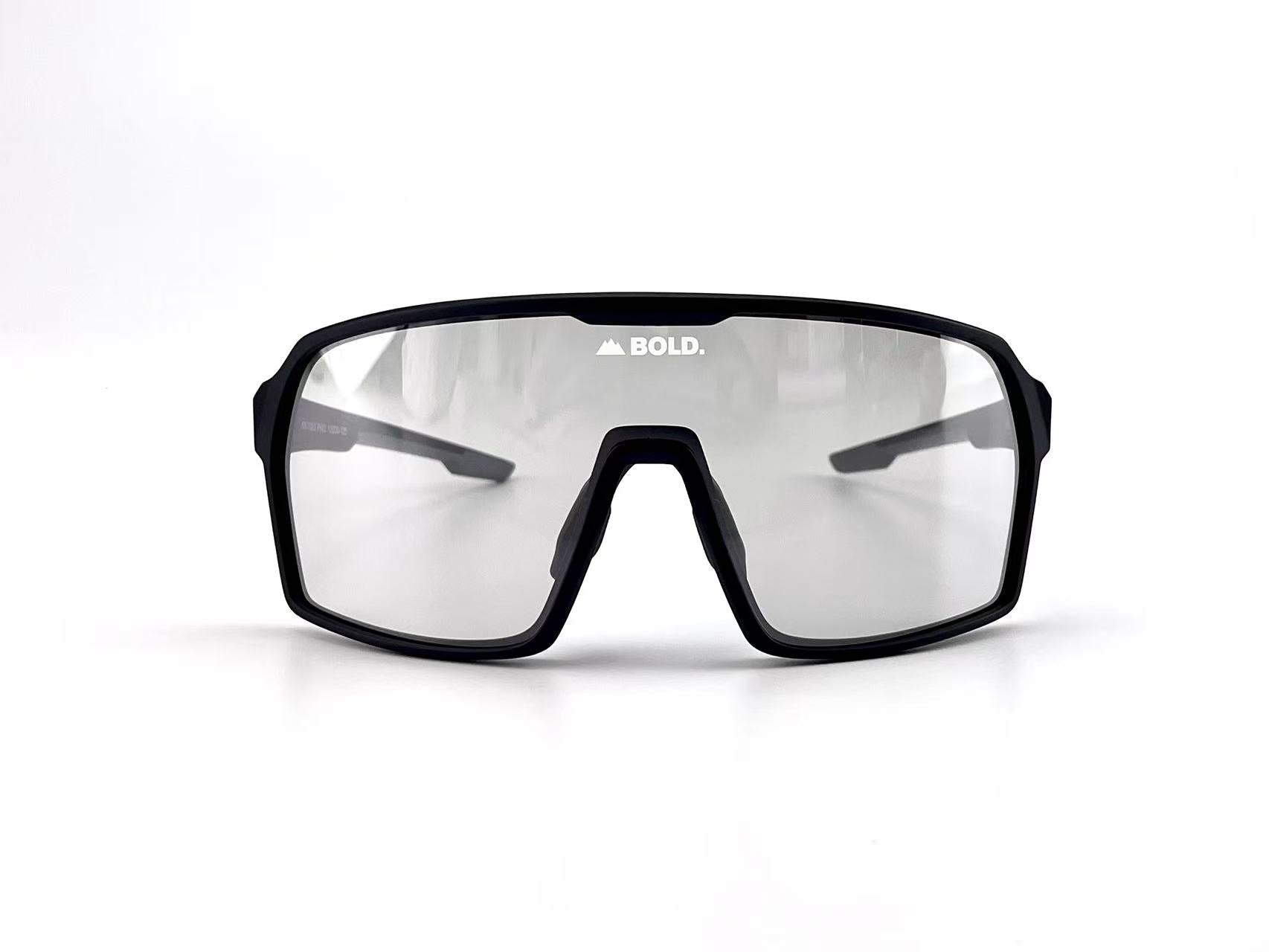 Boldouterwear BOLD Drift photochromic sunglasses with outdoor-ready tinted lenses and sleek black frames.