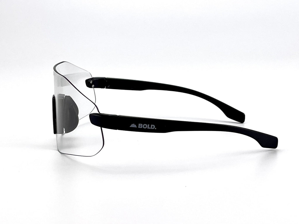Boldouterwear BOLD Emerald photochromic sunglasses with green-tinted lenses and sleek outdoor eyewear design.