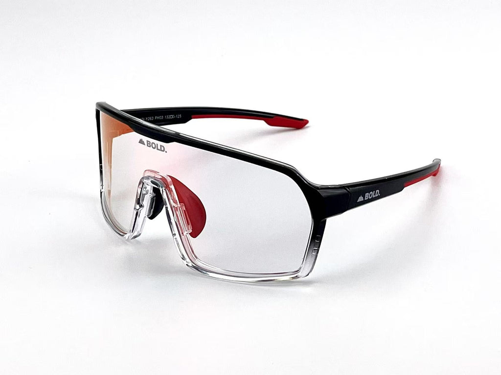 Boldouterwear Drift photochromic sunglasses with dark tinted lenses and sleek black frame, designed for outdoor wear.
