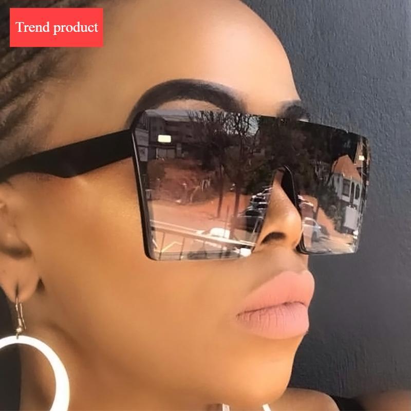 Stevvex oversized square UV400 sunglasses with modern design and dark tinted lenses, ideal for stylish sun protection.
