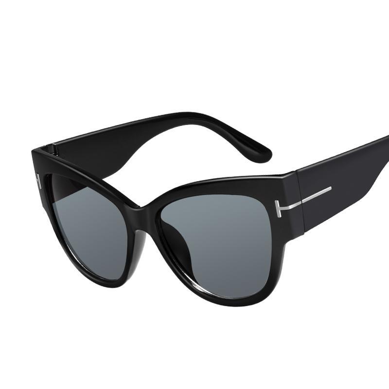 Stevvex oversized cat eye polarized sunglasses for women with UV400 protection, featuring stylish black frames and tinted lenses.