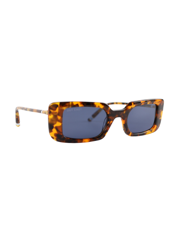 Out East Eyewear Willow sunglasses with round frames and tinted lenses, stylishly displayed against a neutral background.