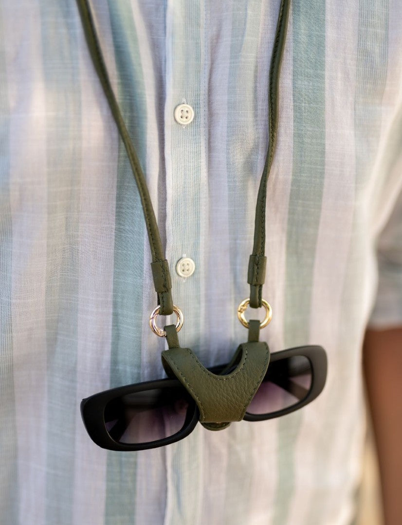 Econock Austere sunglass holder with lanyard, black eyewear accessory featuring secure strap and convenient hanging design.
