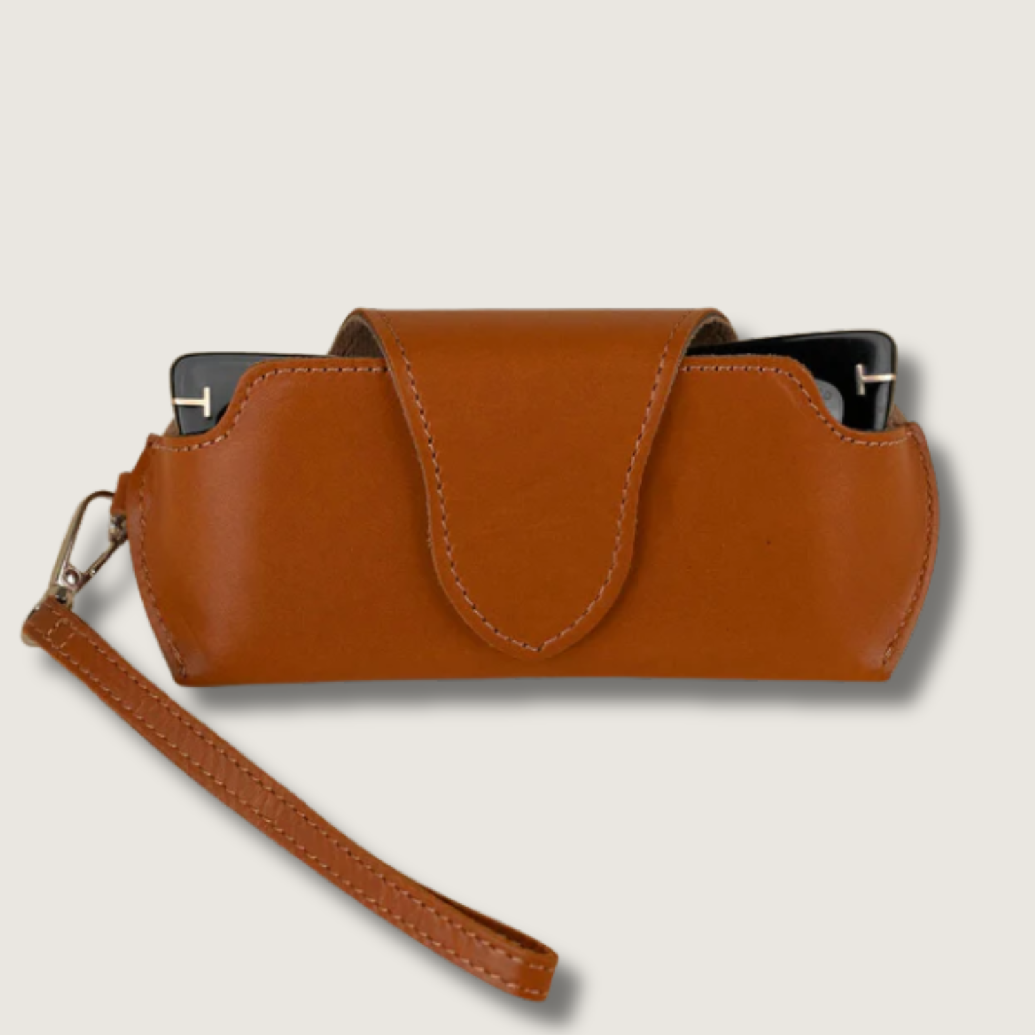 Medium brown leather sunglass case with wrist strap by LEATHERE, designed for eyewear accessories and stylish protection.