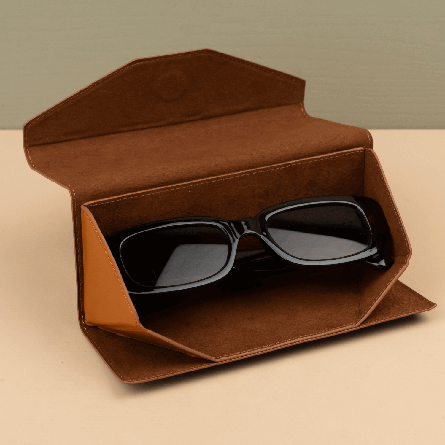 Luxury leather sunglasses case in rustic brown by LEATHERE, designed for eyewear accessories and stylish protection.