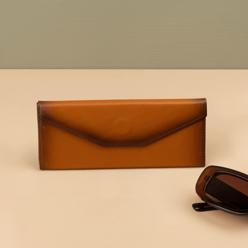 Rustic brown luxury leather sunglasses case by LEATHERE, designed for eyewear accessories, with a sleek and durable finish.