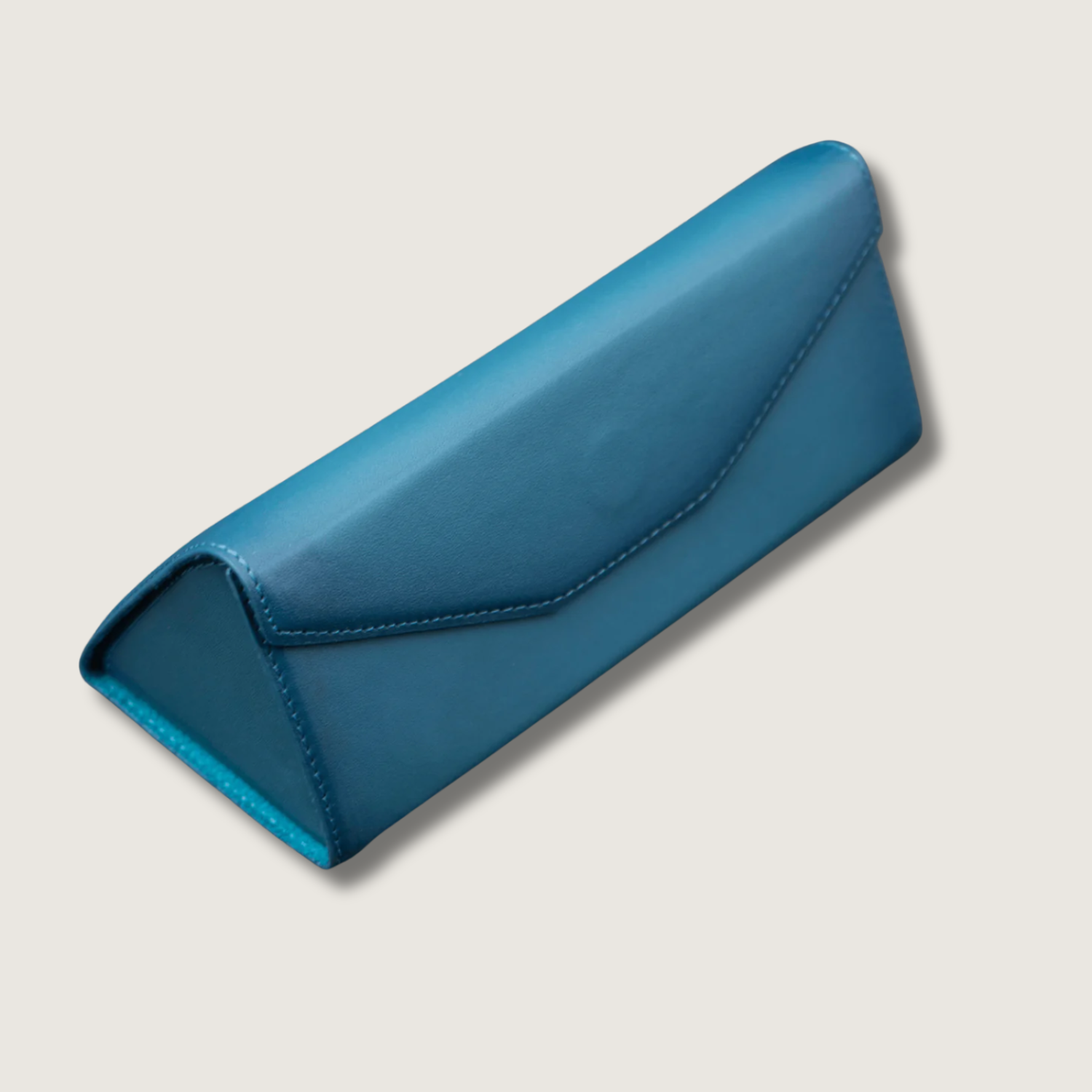 Dark blue luxury leather sunglasses case by LEATHERE, stylish eyewear accessory with soft interior for protection.