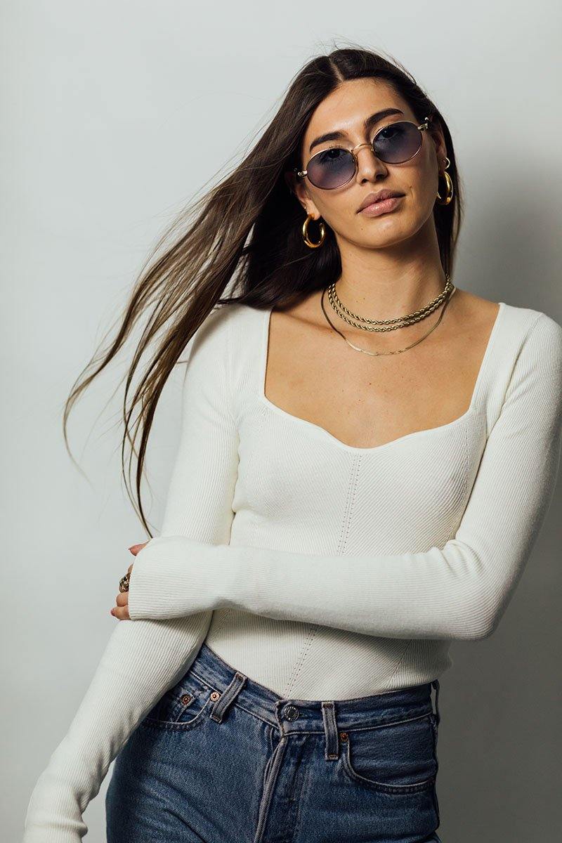Out East Eyewear Meadow Sunglasses with round frames and tinted lenses, stylish and perfect for sunny days.