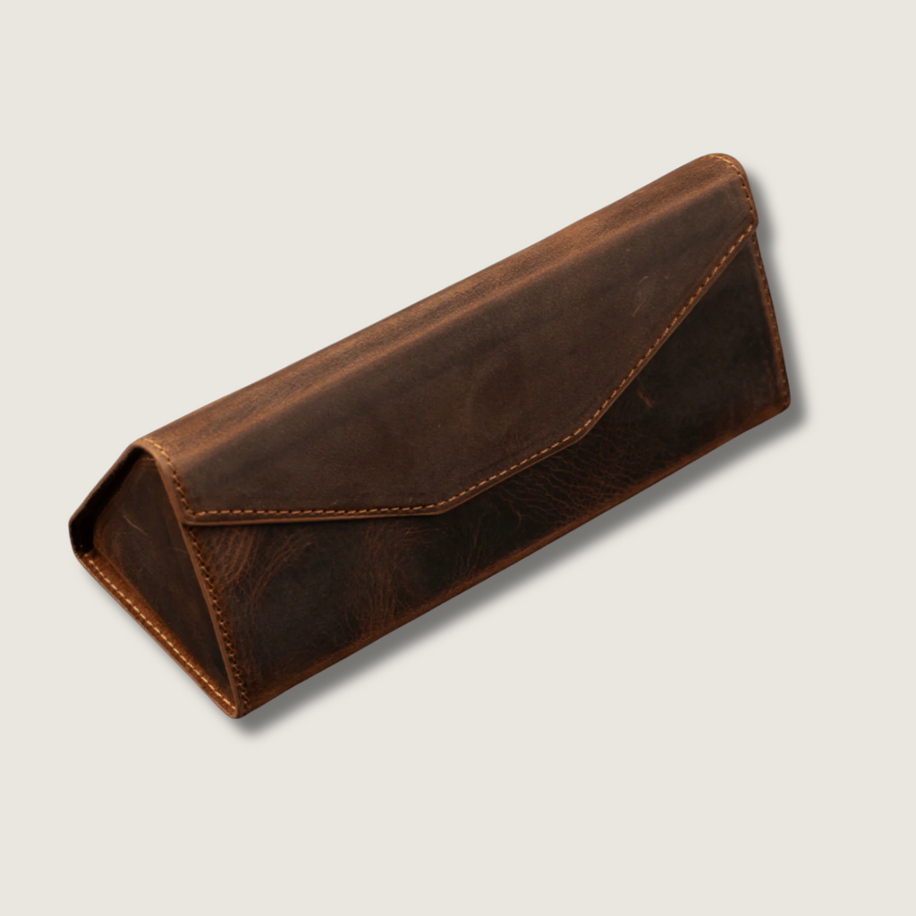 Dark brown luxury leather sunglasses case by LEATHERE, stylish eyewear accessory with sleek, high-quality leather finish.