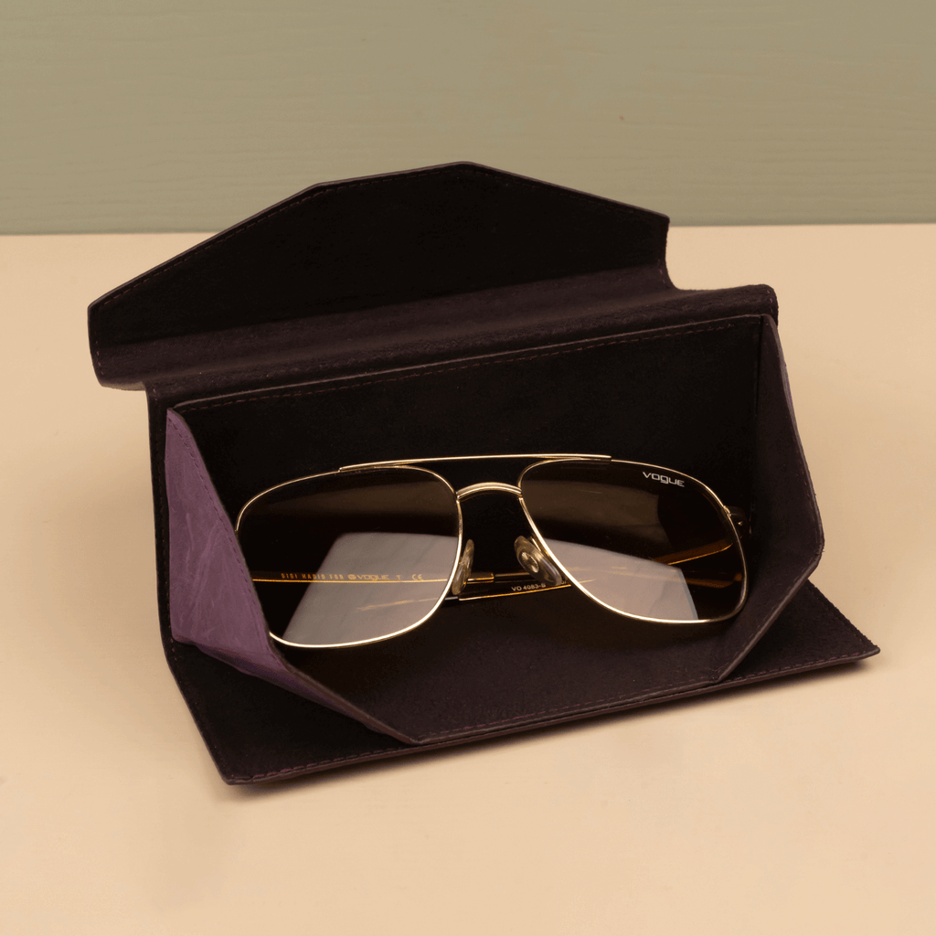 Purple luxury leather sunglasses case by LEATHERE, designed for stylish eyewear protection and storage.