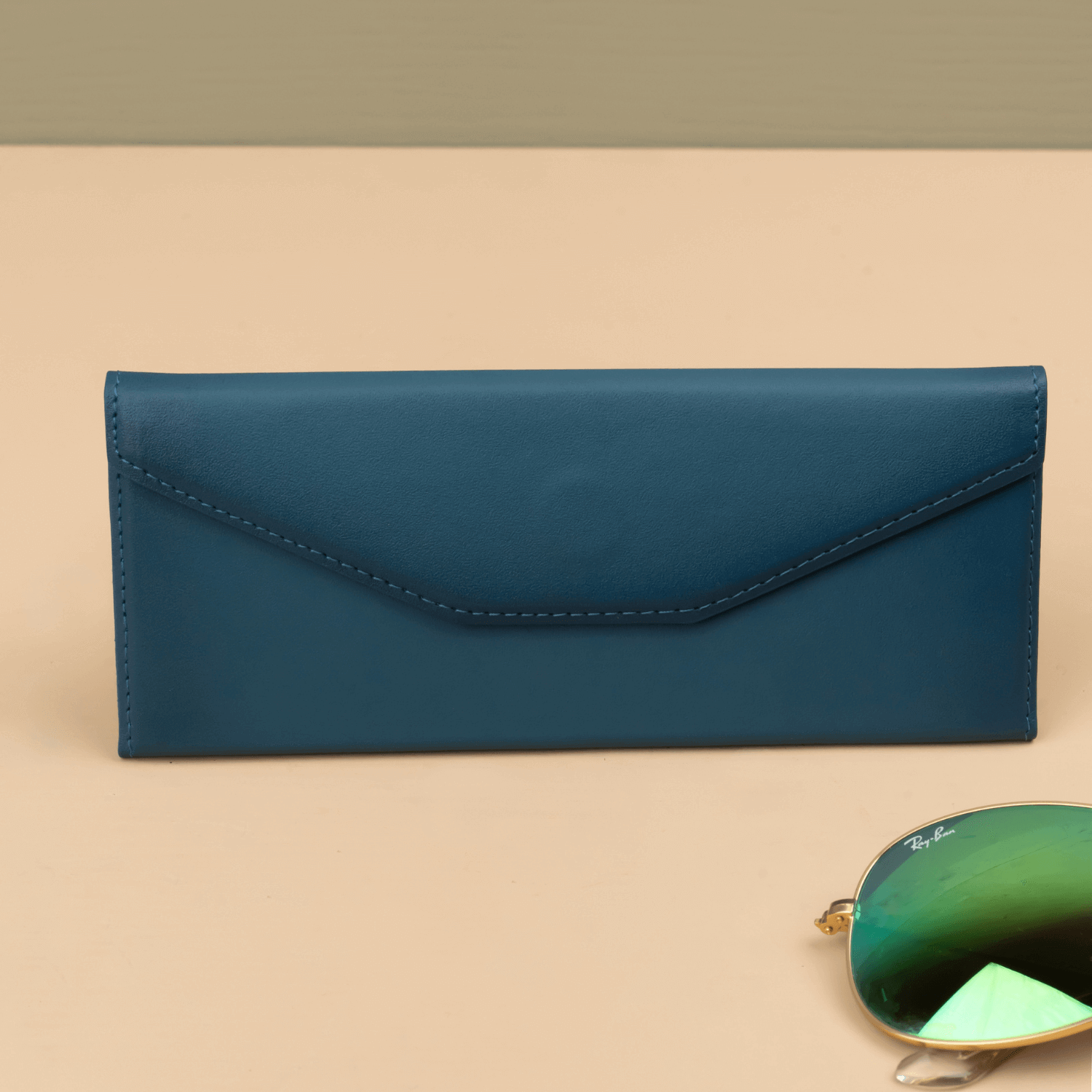 Dark blue luxury leather sunglasses case by LEATHERE, designed for eyewear accessories with a sleek, durable finish.
