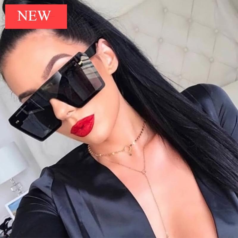 Stevvex oversized square UV400 sunglasses with modern design and black frames, stylishly displayed in the image.