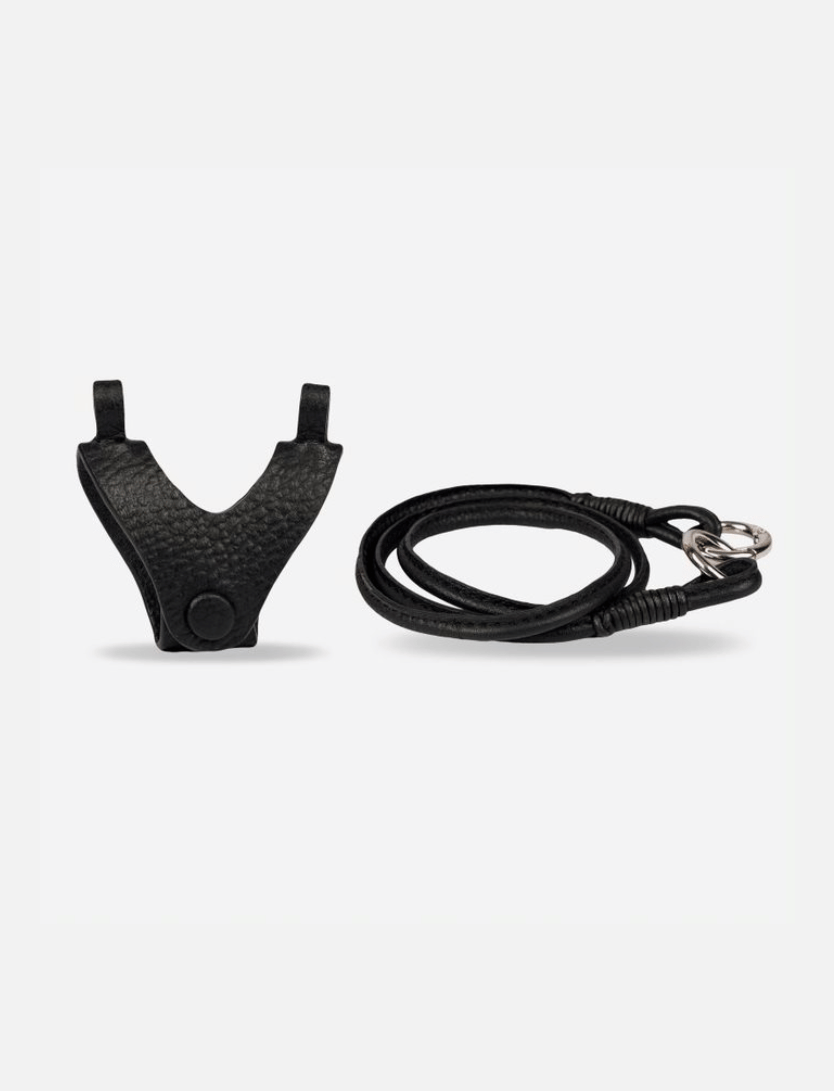 Econock Austere sunglass holder with lanyard in black upcycled leather, handcrafted eyewear accessory with secure closure.