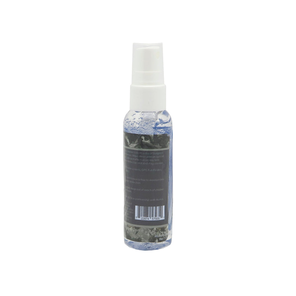OutLaw Eyewear Mossy Oak ClearShot lens cleaner spray and anti-fog solution bottle on a white background.