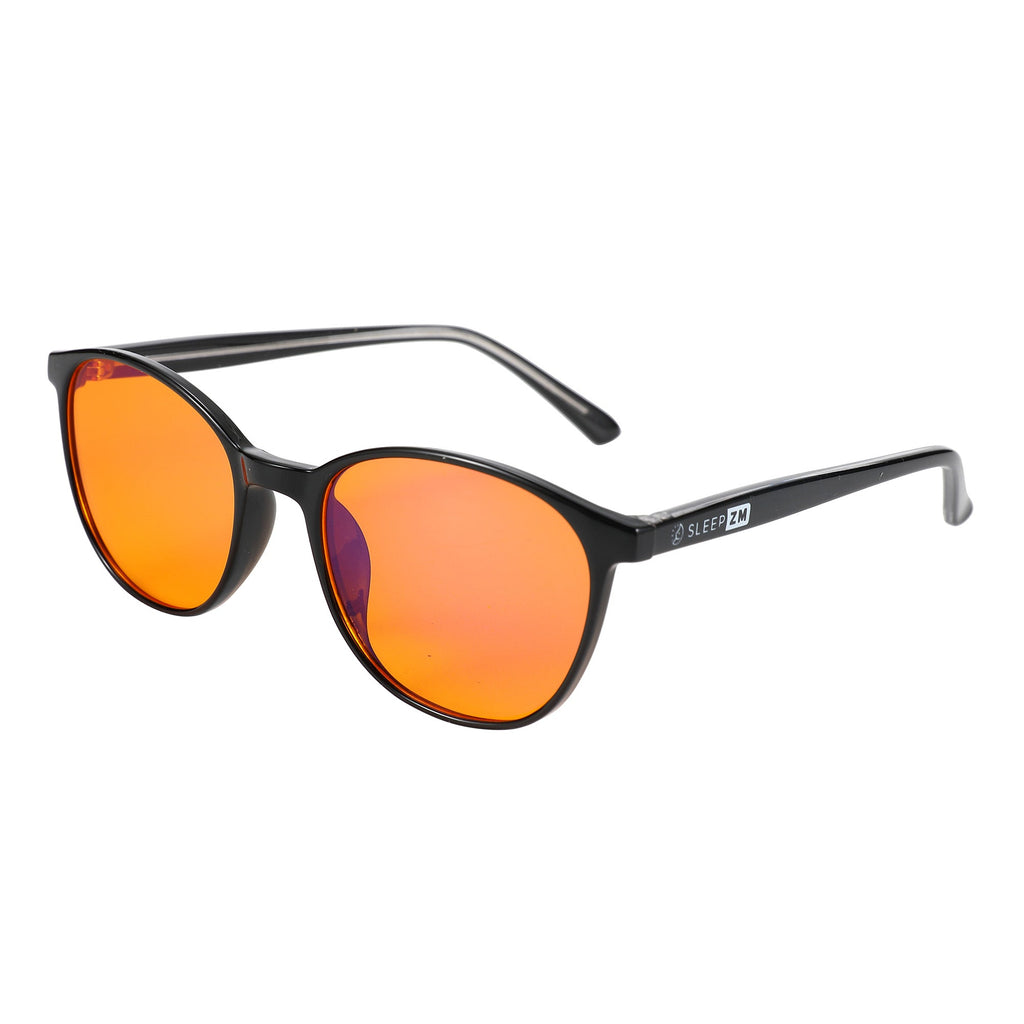 Blue light blocking glasses for kids by Sleep ZM, featuring black frames and orange lenses, designed to reduce blue light exposure.