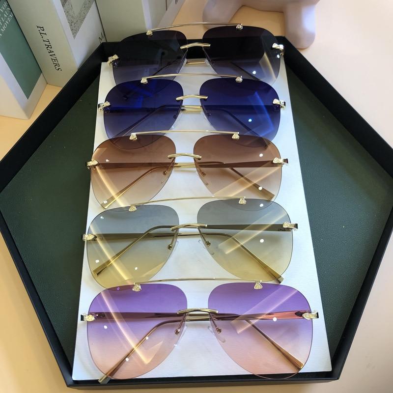Stevvex metal rimless UV-protected gradient sunglasses with sleek frame and tinted lenses, stylish for outdoor wear