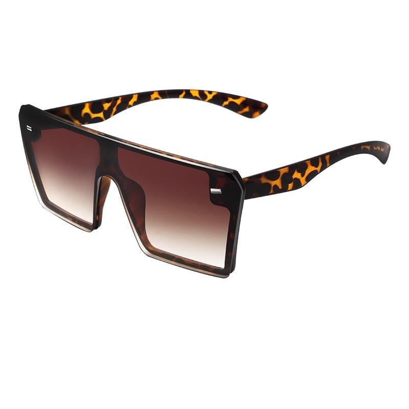 Stylish oversized square UV400 sunglasses by Stevvex with modern design and black frames for a trendy, fashionable look.