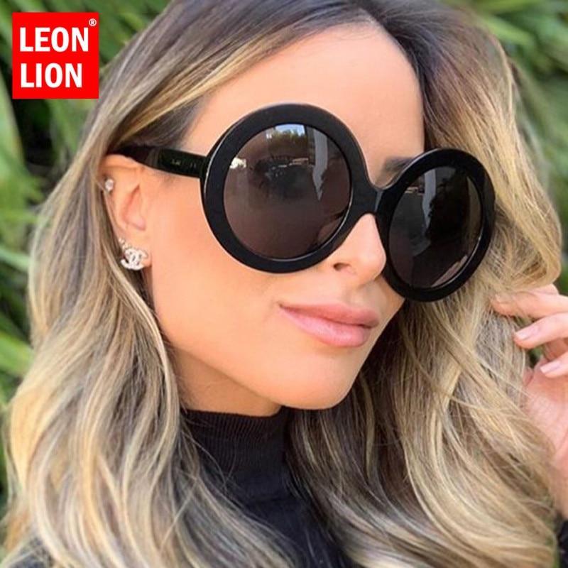 Stevvex oversized oval vintage sunglasses with UV400 protection and elegant design, featuring large tinted lenses.