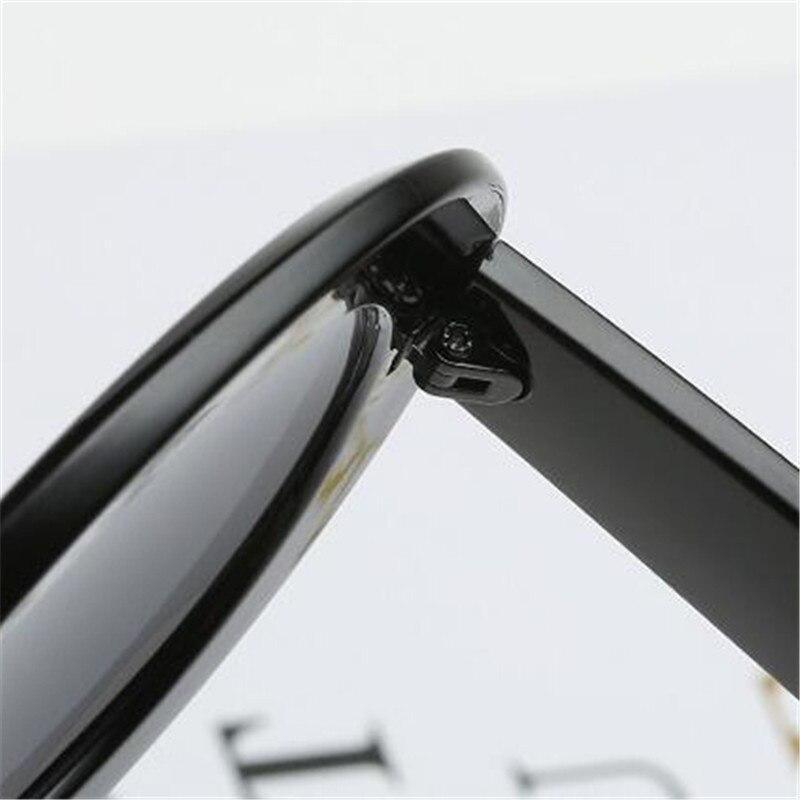 Stevvex oversized oval vintage UV400 sunglasses with large dark lenses and elegant design, ideal for stylish sun protection.