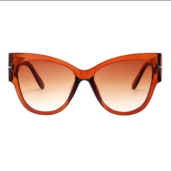Stevvex oversized cat eye polarized UV400 sunglasses for women with bold black frames and dark tinted lenses.