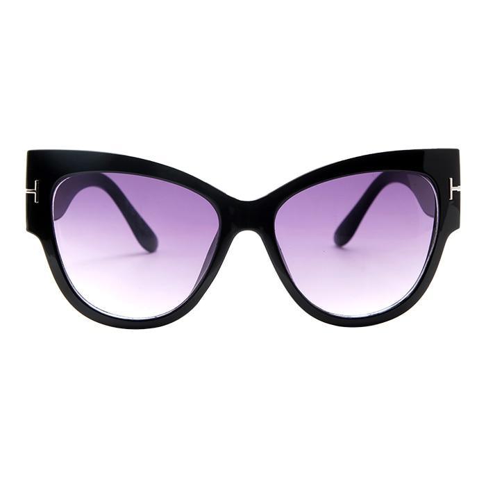 Stevvex oversized cat eye polarized UV400 sunglasses for women with black frames and dark tinted lenses, stylish and protective eyewear.