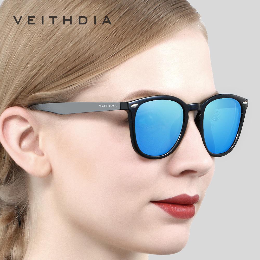 Stevvex luxury unisex aluminum and TR90 photochromic mirror sunglasses with sleek frame and tinted lenses on a white background
